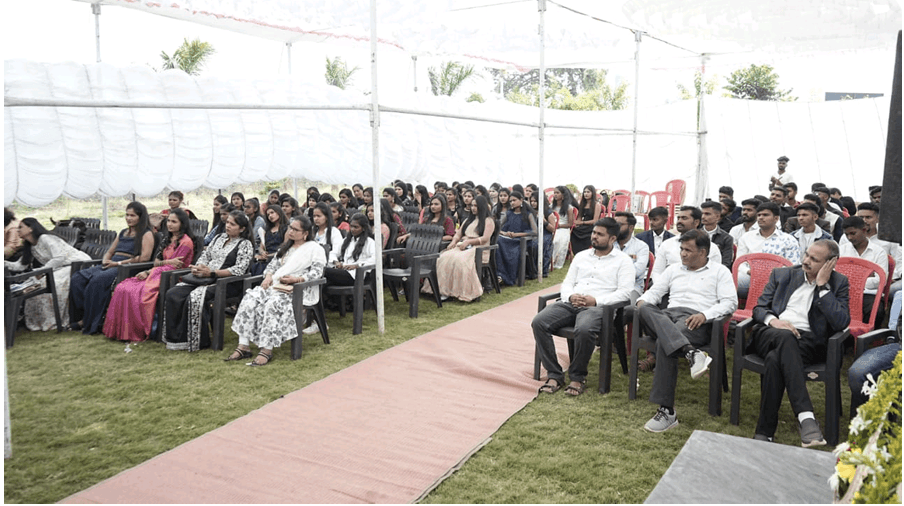 Convocation audience and guests seated under shamiana tent