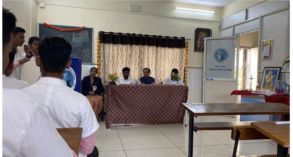 Faculty dignitaries and student assembly on Independence Day