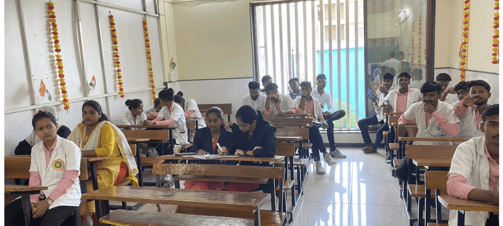 Students in lab coats wearing tricolor badges during speeches