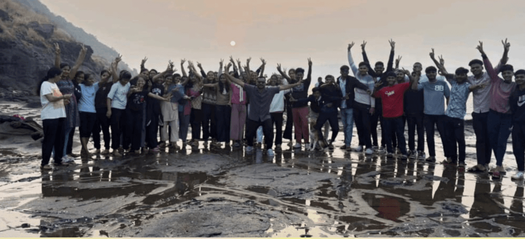 Sunset beach group photo of KK Patil Paramedical College students